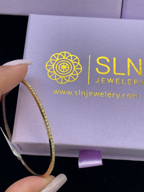 Timeless Glow: Daily Luxury with 10K Gold Bangle Bracelets