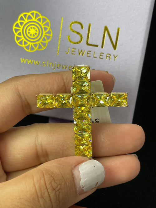 Divine Sparkle: 10K Gold Gemstone Cross Pendant