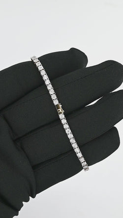 Four Prong Perfection: 10K Gold Tennis Bracelet - A Touch of Elegance