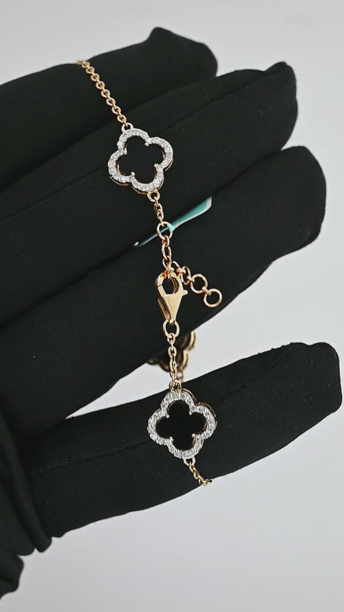 Radiant Charm: 14k Gold Clover Bracelet